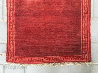 #2059 Tibet rug, simple red color , 丁 hui veins selvage, complete one, tightly row knitting, wool warp and weft. Very good age and 
quality. Size 60*80cm(23*31")      