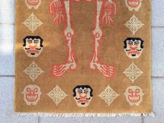 Fake Tibetan rug, light camel background with skeleton pattern. Good condition. Size 172*87cm(67*34”)                    