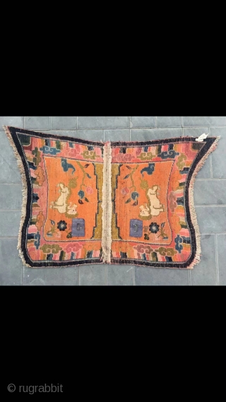 Tibetan butterfly horse saddle, about mid Qing Dynasty. Orange background with snow  mountain lion veins. Good age and condition. Size 120*74cm( 47*29”)
          