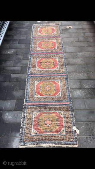 #2071 Tibet rug, five joined mat long rug, wool warp and weft. Coral red background with medallions flowers pattern. It used by lama pray in temple. Good age and quality, no any  ...