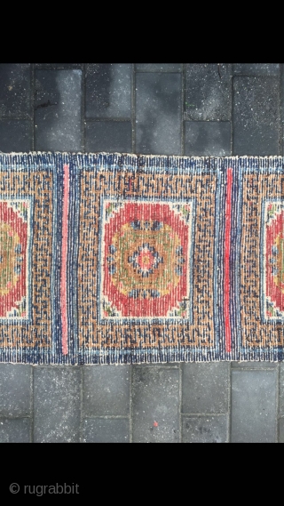 #2071 Tibet rug, five joined mat long rug, wool warp and weft. Coral red background with medallions flowers pattern. It used by lama pray in temple. Good age and quality, no any  ...