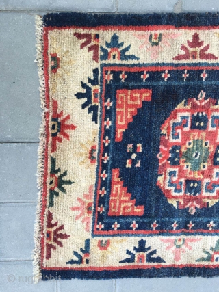 #2075 Tibet rug, blue background with single medallion flower pattern, around with beautiful colorful flowers selvage. Good age and quality. The wool of the rug very good and bright. Wool warp and  ...