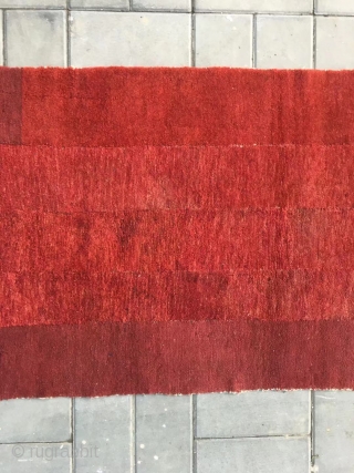 Tibetan rug, very nice red color, good age and wool quality, five strips are sewn together. Size 80*150cm (30*59”)
              