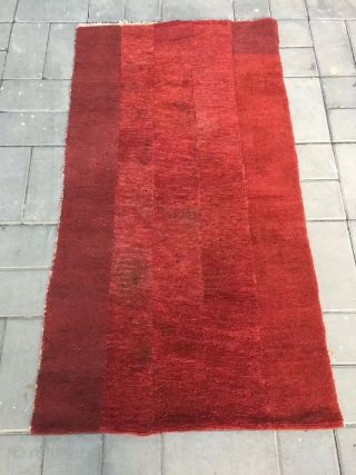 Tibetan rug, very nice red color, good age and wool quality, five strips are sewn together. Size 80*150cm (30*59”)
              