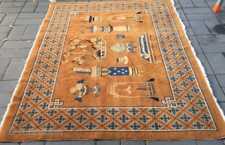 Chinese Baotou rug, camel background with Ancient Chinese vases and flower patterns . Good condition. Size 140*210cm(55*82”)                