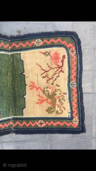 Tibetan horse saddle rug, Light camel background with  snow mountain lion pattern. Good age and condition. Wool warp and weft.
Size 95*62cm(37*24”)           