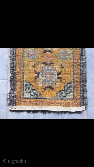 Tibetan rug, Yellow color with group flowers and lucky clouds  veins . about late Qing Dynasty. Good age. Size 80*160(31*62”)            