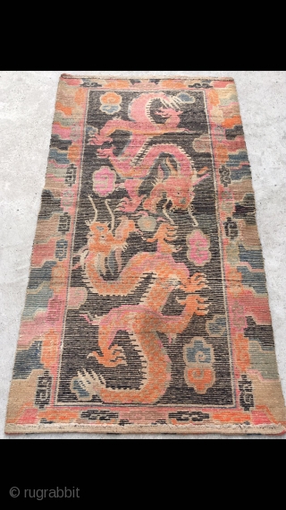 Tibet rug, blue background with double dragon and lucky cloud pattern. Good age and condition. Size 88*162cm(34*63”)                