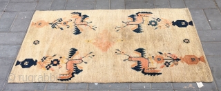 Tibet rug, The symmetrical pattern of golden chickens and vases and flowers is very interesting and rare. Good age and condition. Size 87*150cm(34*59”)          