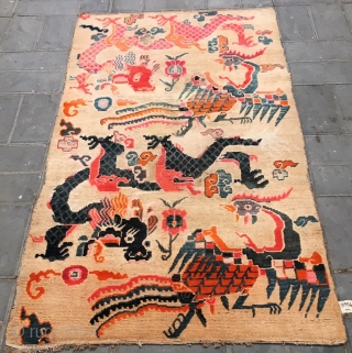 Tibet rug, Double dragon and double phoenix with lucky  cloud pattern,  Good age and condition. Size  90*175cm (35*68”)            