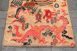 Tibet rug, Double dragon and double phoenix with lucky  cloud pattern,  Good age and condition. Size  90*175cm (35*68”)            