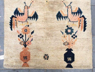 Tibet rug, The symmetrical pattern of golden chickens and vases and flowers is very interesting and rare. Good age and condition. Size 87*150cm(34*59”)          