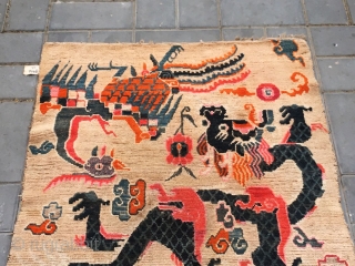 Tibet rug, Double dragon and double phoenix with lucky  cloud pattern,  Good age and condition. Size  90*175cm (35*68”)            