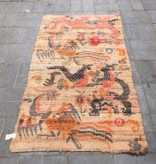 Tibet rug, Double dragon and double phoenix with lucky  cloud pattern,  Good age and condition. Size  90*175cm (35*68”)            