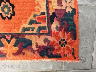 Tibetan square rug, beautiful orange with single group flower veins, around nature color flowers selvage. Good age and condition. Size 62*60cm

            