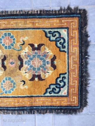 Tibet rug, yellow background with nice group flowers pattern, Lucky clouds  in the four corner. Good age and condition. Size 160*88cm(62*34”). Wool warp and weft       