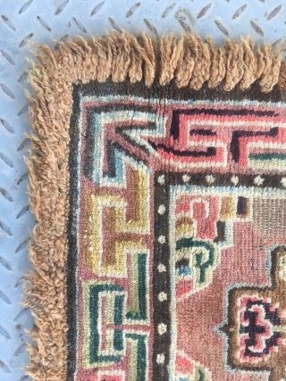 Tibetan square rug, single cross shape flower around lucky cloud veins. Very beautiful colorful and good quality. Wool warp and weft. Tightly row knots. Very good age. Size 68*68cm    