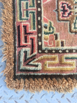 Tibetan square rug, single cross shape flower around lucky cloud veins. Very beautiful colorful and good quality. Wool warp and weft. Tightly row knots. Very good age. Size 68*68cm    