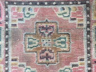 Tibetan square rug, single cross shape flower around lucky cloud veins. Very beautiful colorful and good quality. Wool warp and weft. Tightly row knots. Very good age. Size 68*68cm    