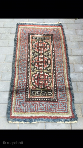 Tibet rug, green background with three medallion veins. Good age and condition. Size 88*168cm(34*66”)                   