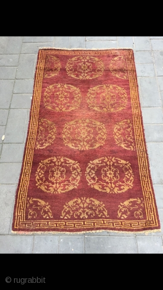 Tibet rug, red background with medallion flowers , good age and condition. Size 90*155cm(35*60”)                   