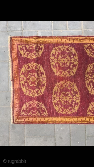 Tibet rug, red background with medallion flowers , good age and condition. Size 90*155cm(35*60”)                   