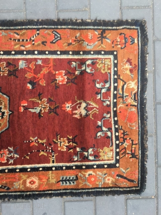 #1903 Tibet rug, red background wiht single group flower and around full of flower pattern.
good age and quality. wool warp and weft. size 165*88cm( 65*34'')        