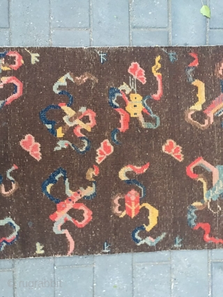 #2008 Tibet rug, it was produced about late Qing Dynasty. The brown background with eight Buddha lucky things. Which are eight kinds of treasures offered by the temples. They are the avatar  ...