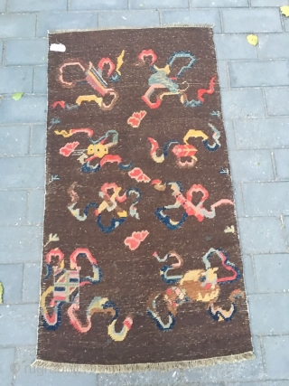 #2008 Tibet rug, it was produced about late Qing Dynasty. The brown background with eight Buddha lucky things. Which are eight kinds of treasures offered by the temples. They are the avatar  ...