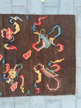 #2008 Tibet rug, it was produced about late Qing Dynasty. The brown background with eight Buddha lucky things. Which are eight kinds of treasures offered by the temples. They are the avatar  ...