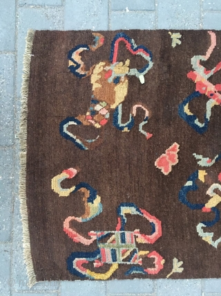#2008 Tibet rug, it was produced about late Qing Dynasty. The brown background with eight Buddha lucky things. Which are eight kinds of treasures offered by the temples. They are the avatar  ...