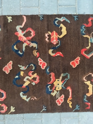 #2008 Tibet rug, it was produced about late Qing Dynasty. The brown background with eight Buddha lucky things. Which are eight kinds of treasures offered by the temples. They are the avatar  ...