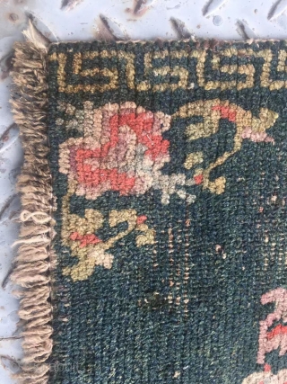 Tibet rug, very nice green color with single group flower pattern. Good age. Size 64*52cm(25*20”)                  