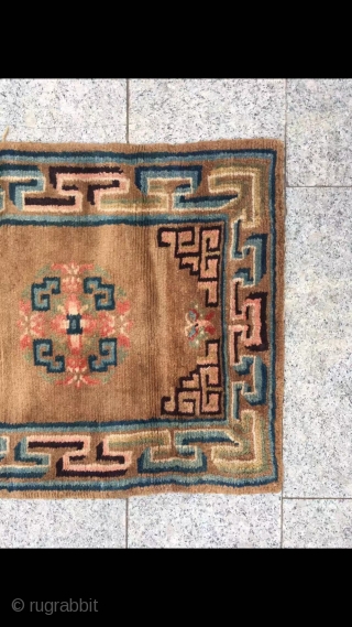 Tibetan rug, brown background with group flower veins. Good age and condition. Size 152*67cm( 59*26”)                  