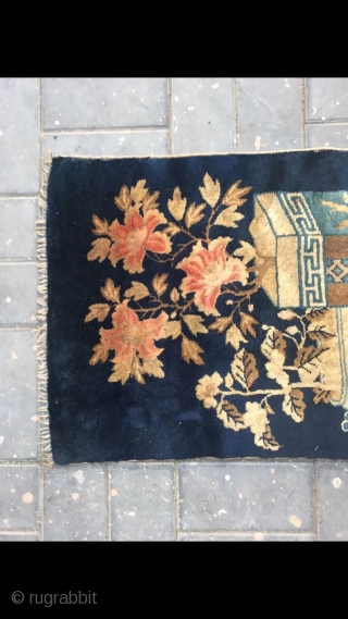 Chinese Baotou rug, blue background with Bogu vase and flowers vines. Good age and condition. Size 66*130cm(26*51”)                