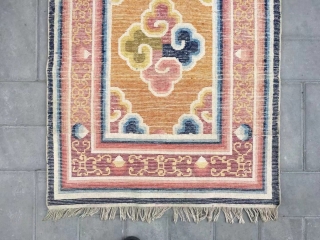 Ningxia rug, yellow-camel background with colorful lucky cloud pattern, around with lucky cloud selvage. Good age and condition. Size 161*76cm             