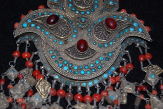 A BEAUTIFUL 19TH CENTURY SILVER UZBEK ORNAMENT FROM BUKHARAH. ITS IN A VERY GOOD CONDITION. IT'S IN A VERY GOOD CONDITION WITH CORAL, TOURQUOISE AND CORNALINE
FOR MORE INFORMATIONS, KINDLY MAIL ME  