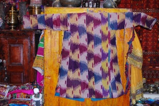 a beautiful ikat chapan from uzbekistan.                           