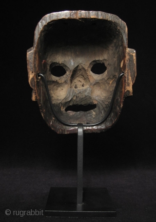 Wood mask, Nepal/Tibet.
8” high by 6.5” wide (20 by 16 cm) plus base.
Late 19th century
                  