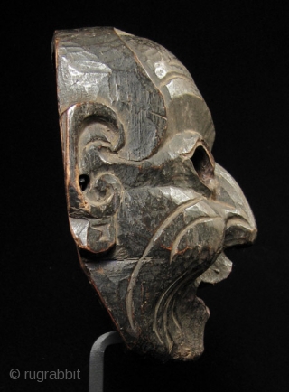 Wood mask, Nepal/Tibet.
8” high by 6.5” wide (20 by 16 cm) plus base.
Late 19th century
                  