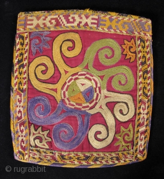 Finely stitched Uzbek bag from Central Asia. 7.5” wide by 8.5” high (19 by 22 cm).                 