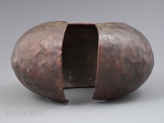 Copper currency anklet,
Mbole, Southeastern D.R. Congo.
Late 19th to early 20th century.Sold separately. 

#9703 24" (61 cm) in circumference by 4" (10 cm) thick 

#9704 25.75" (65.5 cm) in circumference by 6" (15.3  ...