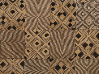 Cut-pile raffia panel, Shoowa people, a northern group of the Kuba, D.R. Congo. 22.5" (57 cm) high by 30" (76.2 cm) wide. Mid-20th century. A fascinating riff on a checkerboard design with  ...