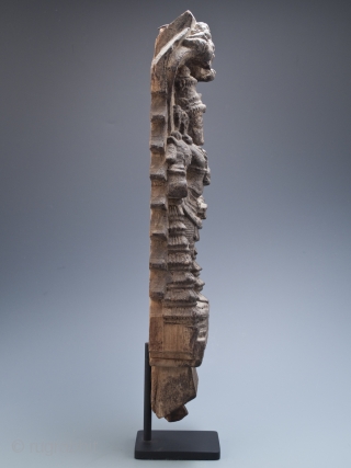 Temple carving of, most likely, Vishnu from Kerala, India.
Carved wood.
18" (45.7 cm) high, 20" (50.8 cm) with base, 5.5" (14 cm) wide
16th to 17th century
#7680        