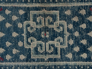 Small wool rug, Tibet. 22" (56 cm) by 35" (89 cm).
Please note: the second images of the full rug and the detail are photos of the back of the rug. They look  ...
