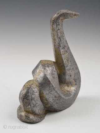 Snake okimono, Japan.
Cast aluminum, remnants of gilding or gold paint.
Mid 20th century.
4.5" (11.4 cm) high by 4" (10 cm) wide.

Last year, a small group of cast iron animals was found in a  ...