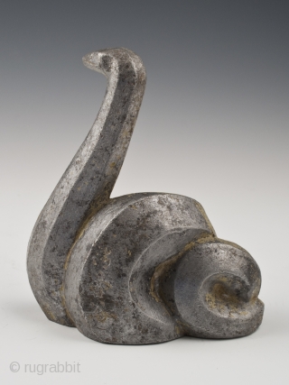 Snake okimono, Japan.
Cast aluminum, remnants of gilding or gold paint.
Mid 20th century.
4.5" (11.4 cm) high by 4" (10 cm) wide.

Last year, a small group of cast iron animals was found in a  ...