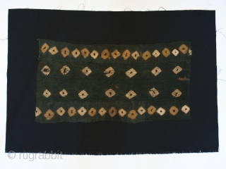 Textile fragment, Nasca culture, Peru. 6-8th c. A.D. camelid wool. 21" (53.3 cm) by 11" (28 cm) mounted on a larger piece of black cotton fabric. Wonderful colors, damage as seen in  ...