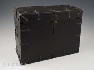 Black box, Tibet.
Wood, fabric, brass.
8" (20.2 cm) high, 10.5" (26.2 cm) wide, 5" (12.7 cm) deep.
Late 19th to very early 20th century.
This fabric-covered wood box tapers slightly toward the top, as seen  ...