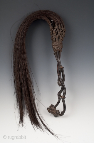 Fly whisk,
Alor Island, Indonesia.
Thorn root, horse hair, copper wire,
Late 19th to early 20th century,
32" long.
Ex. estate collection of Joseph G. Gerena, NYC 
          